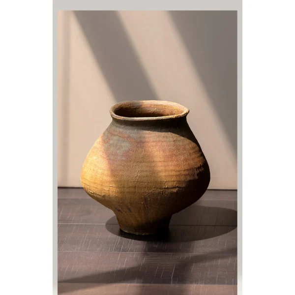 Artist-Made Ribbed Rust-Ochre Wide-Shoulder Jar in clay — in a room setting