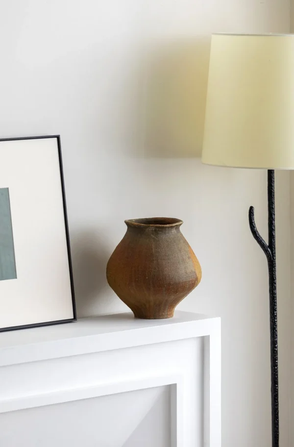 Artist-Made Ribbed Rust-Ochre Wide-Shoulder Jar in clay — in a room setting