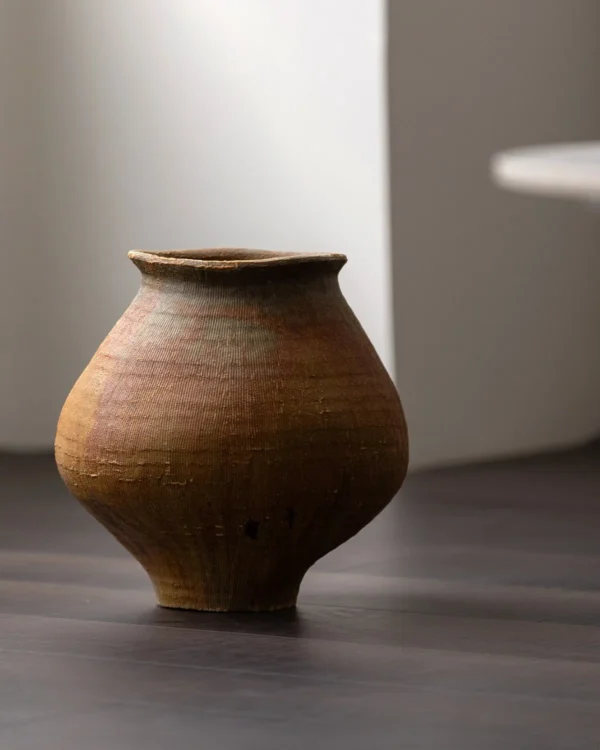 Artist-Made Ribbed Rust-Ochre Wide-Shoulder Jar in clay — in a room setting
