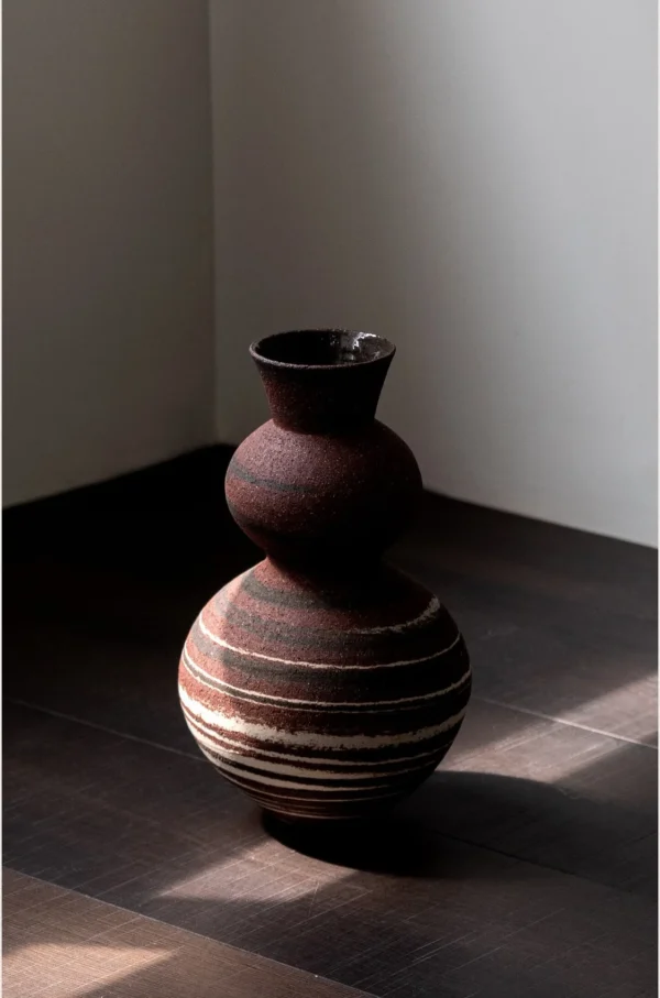 Artist-Made Marbled Clay Gourd Vase with Tree-Ring Pattern in burgundy — in a room setting