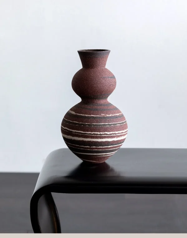 Artist-Made Marbled Clay Gourd Vase with Tree-Ring Pattern in burgundy — in a room setting