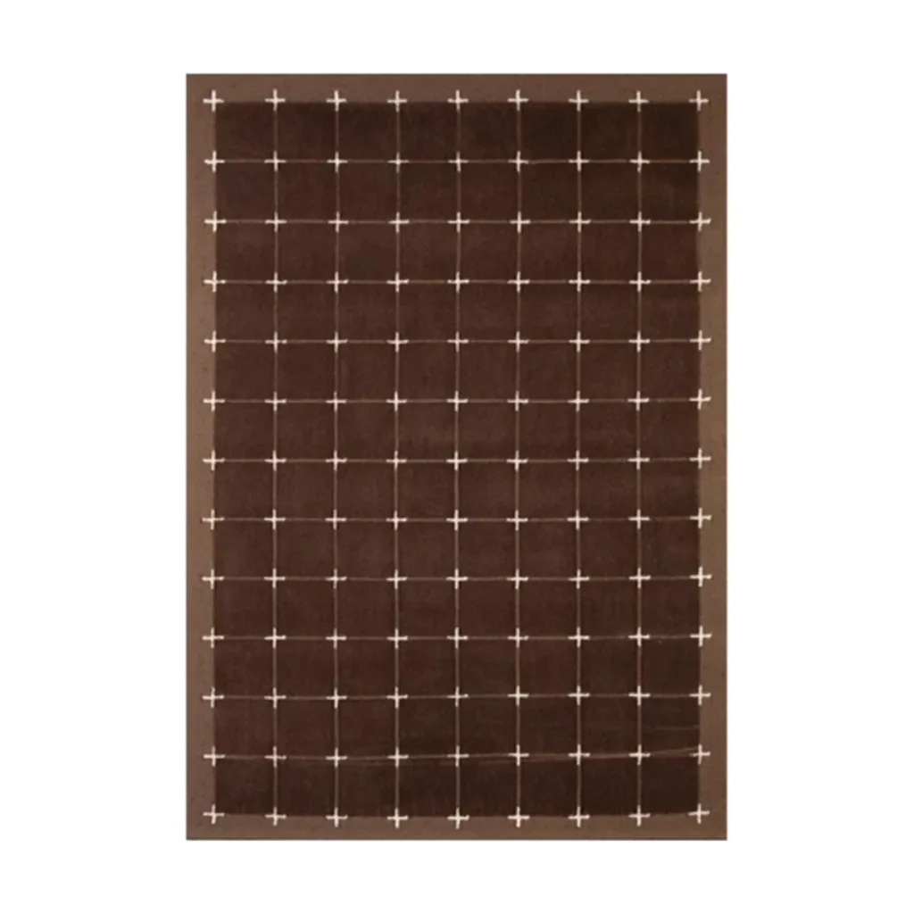 Dark Brown Grid Rug with Cream Cross Dots in clay — front view