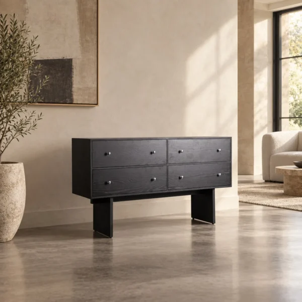 Black Wood-Grain Four-Drawer Chest with Silver Knobs in black — in a room setting