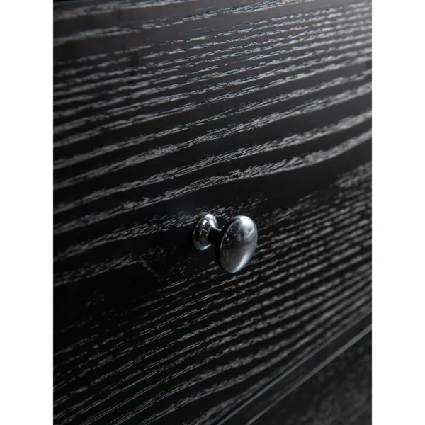 Black Wood-Grain Four-Drawer Chest with Silver Knobs in black — in a room setting