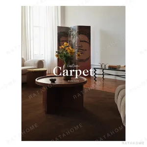 Dark Cocoa Plain Rug in clay — in a room setting