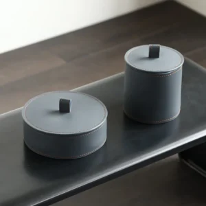 Dark Grey Leather Lidded Storage Jars, Set of Two in slate — front view