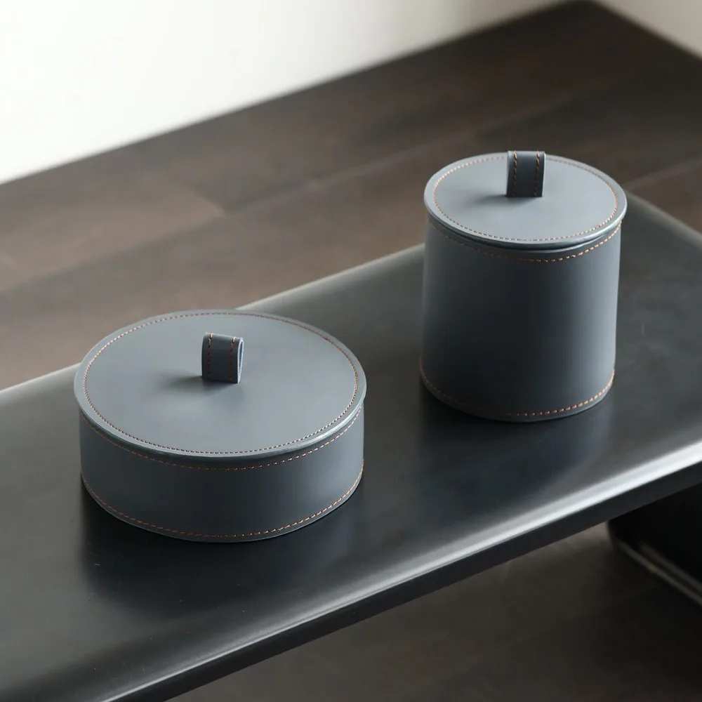 Dark Grey Leather Lidded Storage Jars, Set of Two in slate — front view