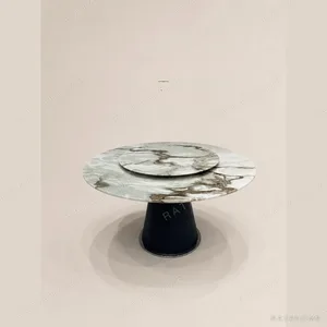 Pale Jade Stone Round Dining Table on Black Cone Base in olive — in a room setting