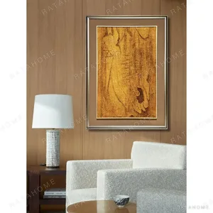 Golden Abstract Wall Art in Silver Frame — in a room setting