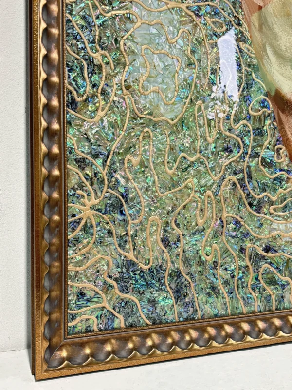 Coral Abstract Wall Art on Teal Ground in Gold Frame — in a room setting