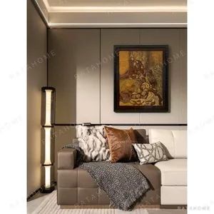 Golden Figure Abstract Wall Art in Ornate Dark Frame — in a room setting