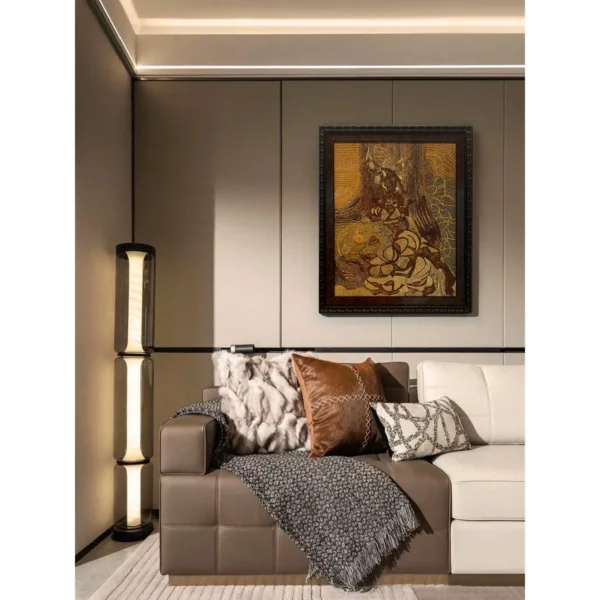 Golden Figure Abstract Wall Art in Ornate Dark Frame — in a room setting