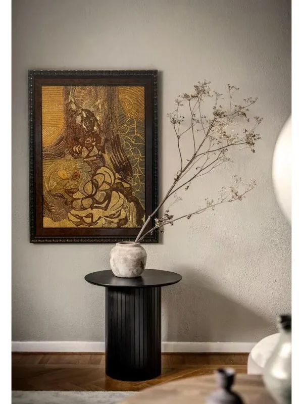Golden Figure Abstract Wall Art in Ornate Dark Frame — in a room setting