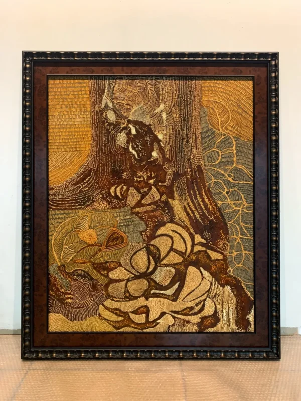 Golden Figure Abstract Wall Art in Ornate Dark Frame — in a room setting