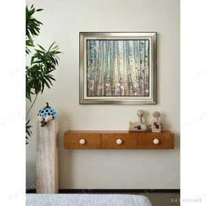 Forest Light Abstract Wall Art in Silver Frame — in a room setting