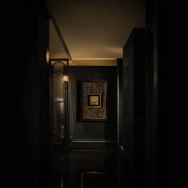 Small Gold Marbled Wall Art in Dark Frame — in a room setting