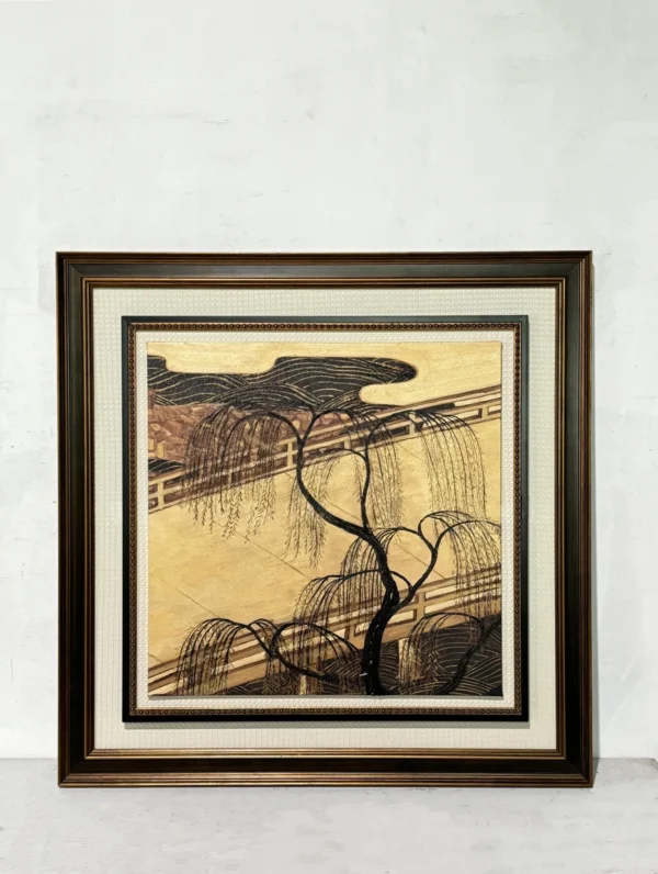 Golden Pine Ink Wall Art in Dark Frame — in a room setting