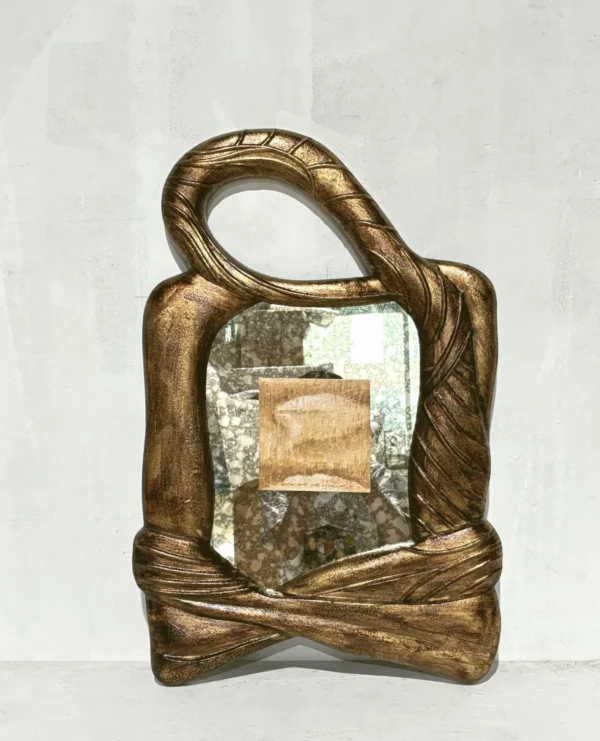 Carved Wood Knot Frame Wall Art in clay — in a room setting