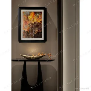 Amber Coral Abstract Wall Art in Black Frame — in a room setting