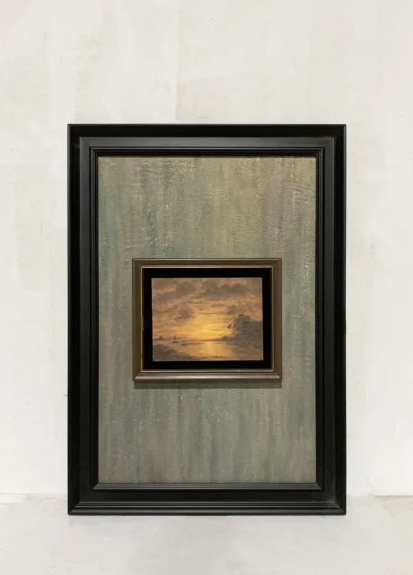 Small Sunset Landscape Wall Art in Dark Frame — in a room setting