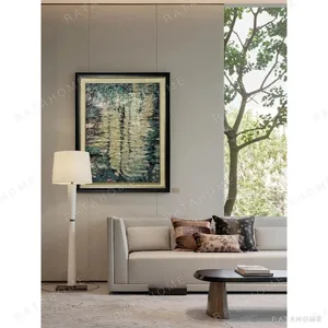 Teal and Gold Abstract Wall Art in Black Frame — in a room setting