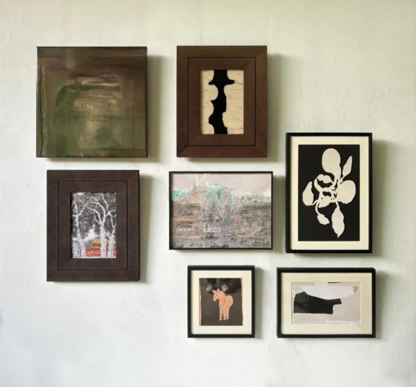 Gallery Wall Art Set of 6 Small Prints in Black Frames — in a room setting