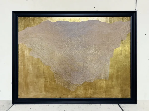 Wide Gold Leaf Mountain Wall Art in Black Frame — in a room setting