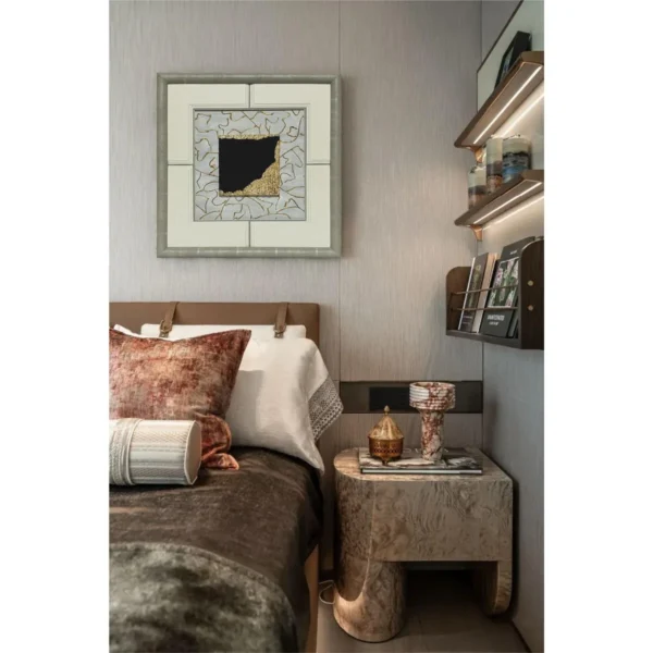 Black and Gold Marble Fragment Wall Art in Cream Frame — in a room setting