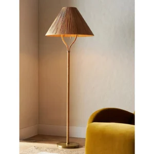 Delphine Antique Brass Floor Lamp in clay — in a room setting