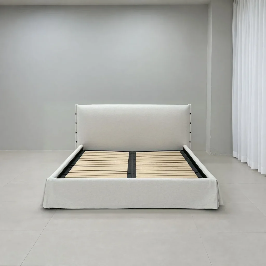 Slipcovered Fabric Bed with Buttoned Headboard in ivory — front view