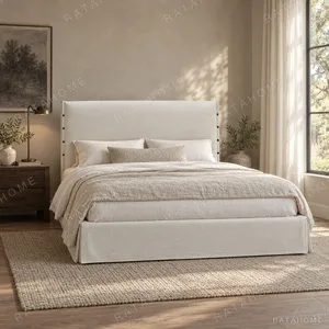 Slipcovered Fabric Bed with Buttoned Headboard in ivory — in a room setting