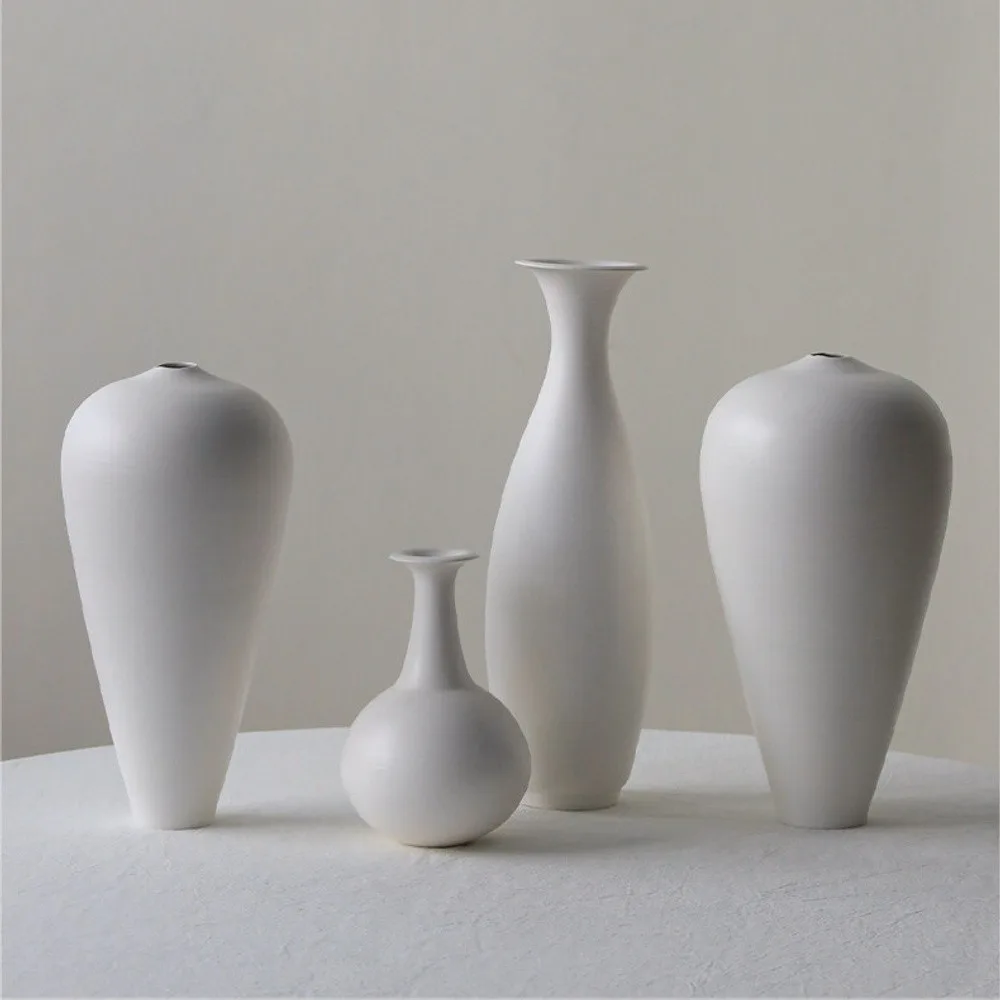 Designer Hand-Made Matte White Bud Vases, Five Forms in ivory — front view