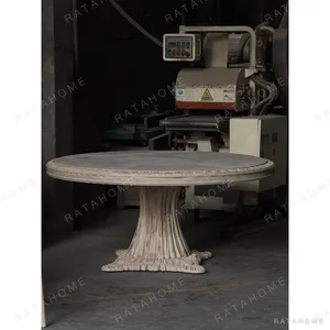 French Carved Round Dining Table, Raw Finish in natural oak — in a room setting