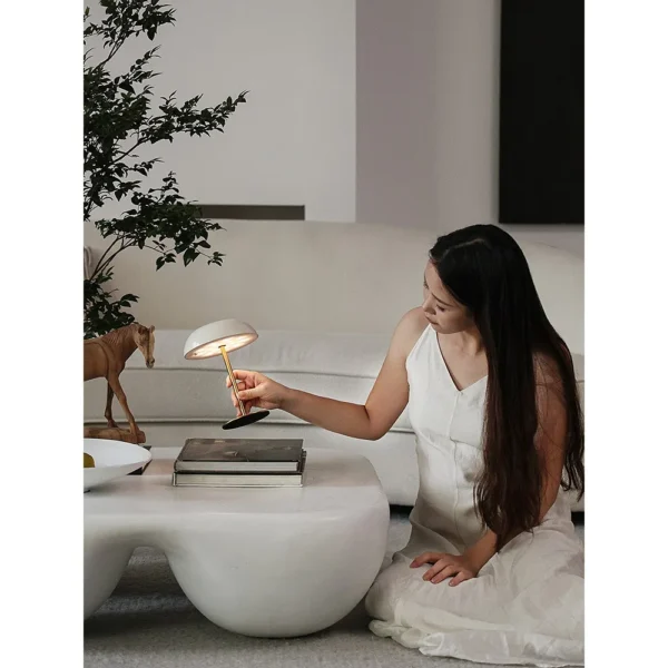 Portable Brass Mushroom Table Lamp with Touch Dimmer in ivory — in a room setting