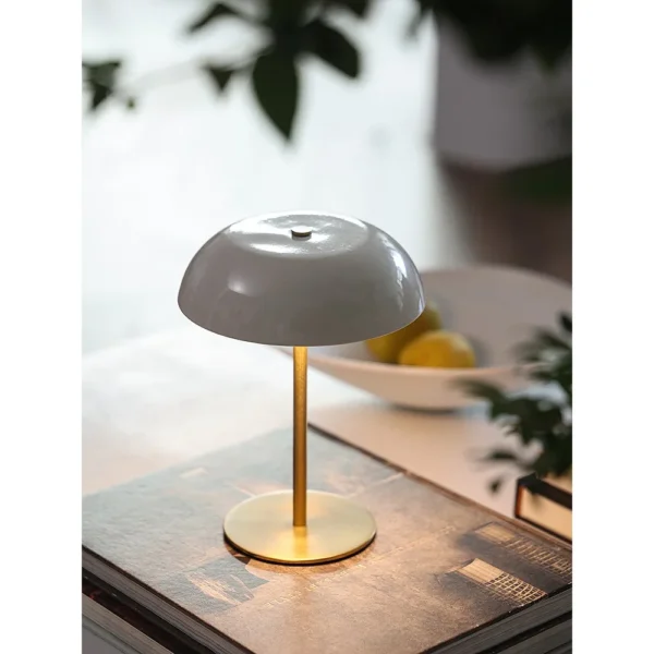 Portable Brass Mushroom Table Lamp with Touch Dimmer in ivory — in a room setting