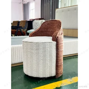 Two-Tone Wraparound Vanity Stool in clay — in a room setting
