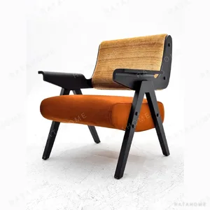 Black Walnut Armchair in black — in a room setting