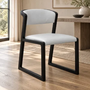 Black Sled-Frame Dining Chair with Curved White Back in black — in a room setting