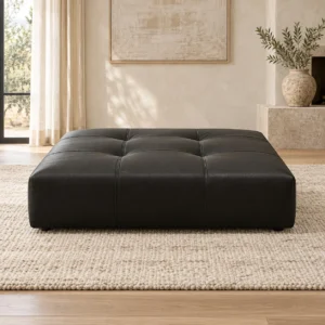 Large Square Tufted Black Leather Ottoman in black — front view