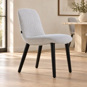 Light Grey Quilted Shell Dining Chair on Black Legs in slate — front view