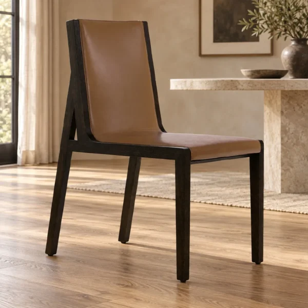 Tan Leather Sling Dining Chair on Black Frame in clay — in a room setting