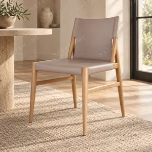 Saddle Leather and Larch Dining Chair in slate — in a room setting