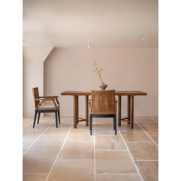 Muyan Rattan and Solid Wood Dining Chair in clay — in a room setting