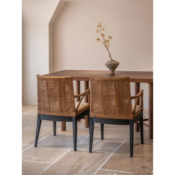 Muyan Rattan and Solid Wood Dining Chair in clay — in a room setting