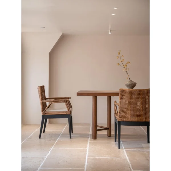 Muyan Rattan and Solid Wood Dining Chair in clay — in a room setting