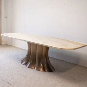 Travertine Dining Table on Bronze Flared Pedestals in oatmeal — front view