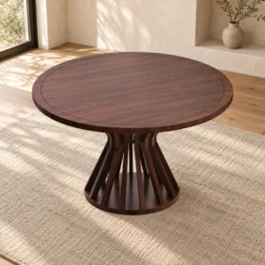 Round Walnut Dining Table on Radial Spindle Base in walnut — in a room setting
