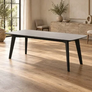 Marble-Top Dining Table on Splayed Black Legs in slate — in a room setting