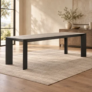 Dining Table with Pale Stone-Look Top and Black Block Legs in oatmeal — in a room setting