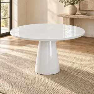White Gloss Round Dining Table on Cone Base in ivory — in a room setting